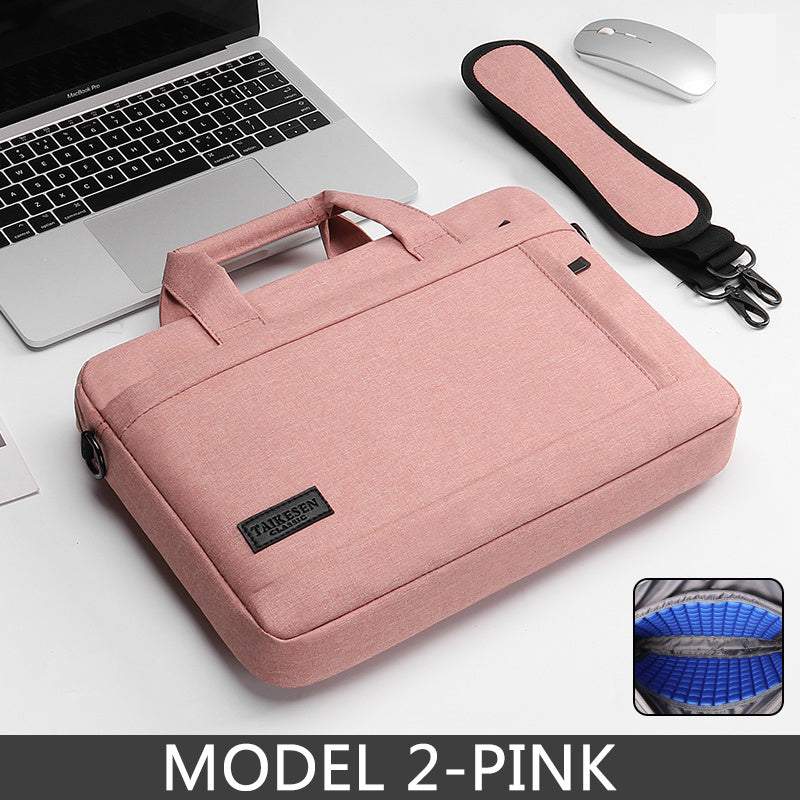 15.6 inch laptop bag in pink style placed on a desk with a laptop, featuring handles and a zipper closure.