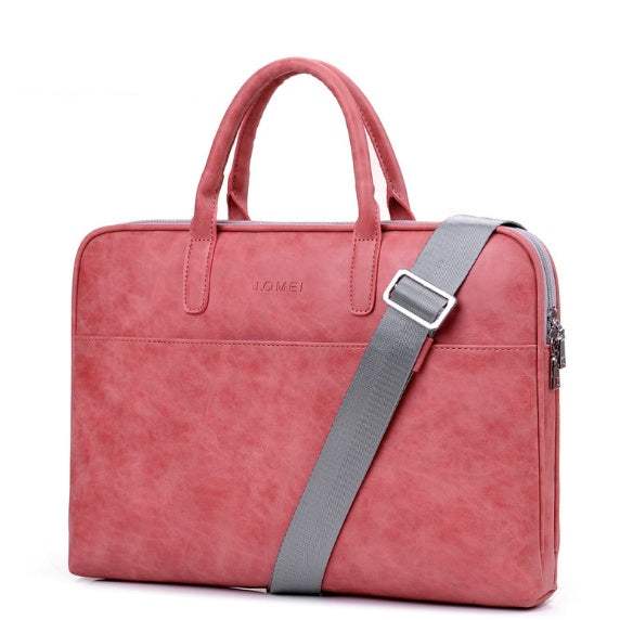 Faux leather laptop bag for women in pink, featuring dual handles and detachable shoulder strap.