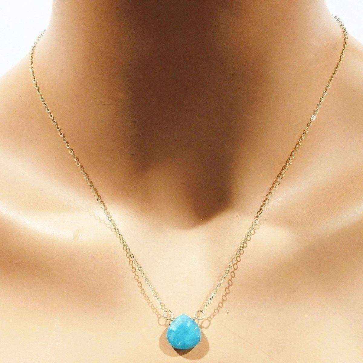14Kt handcrafted gold necklace with aqua jade gemstone drop on a delicate chain, perfect for elegant outfits.