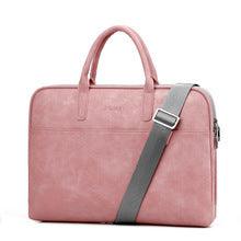 Faux leather laptop bag for women in pink with dual handles and an adjustable shoulder strap.