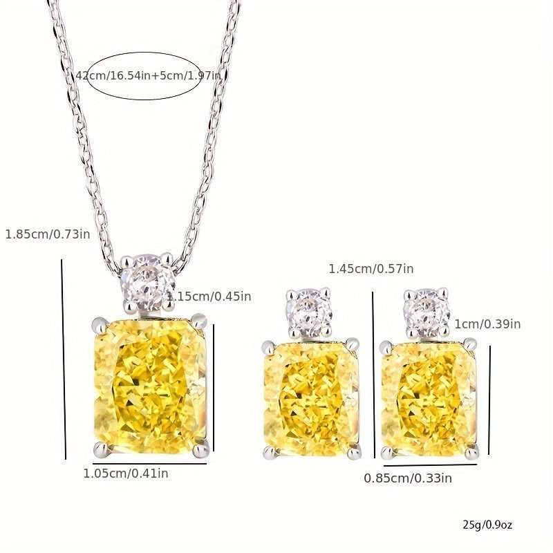 18K gold plated necklace and earrings set with yellow imitation diamonds on a sterling silver chain.