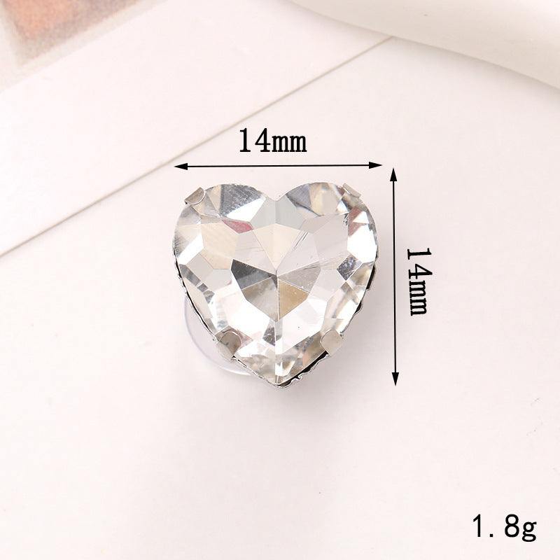 Heart-shaped crystal shoe ornament measuring 14mm for stylish footwear embellishments.