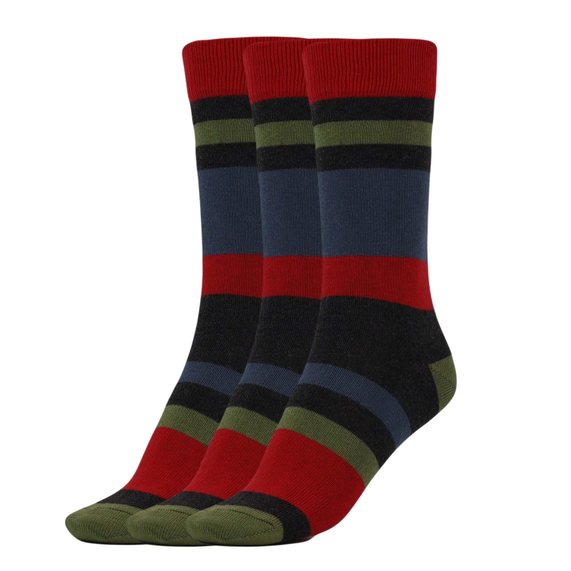 Three pairs of women's striped cotton crew socks with red, black, blue, and green stripes for comfortable casual wear.