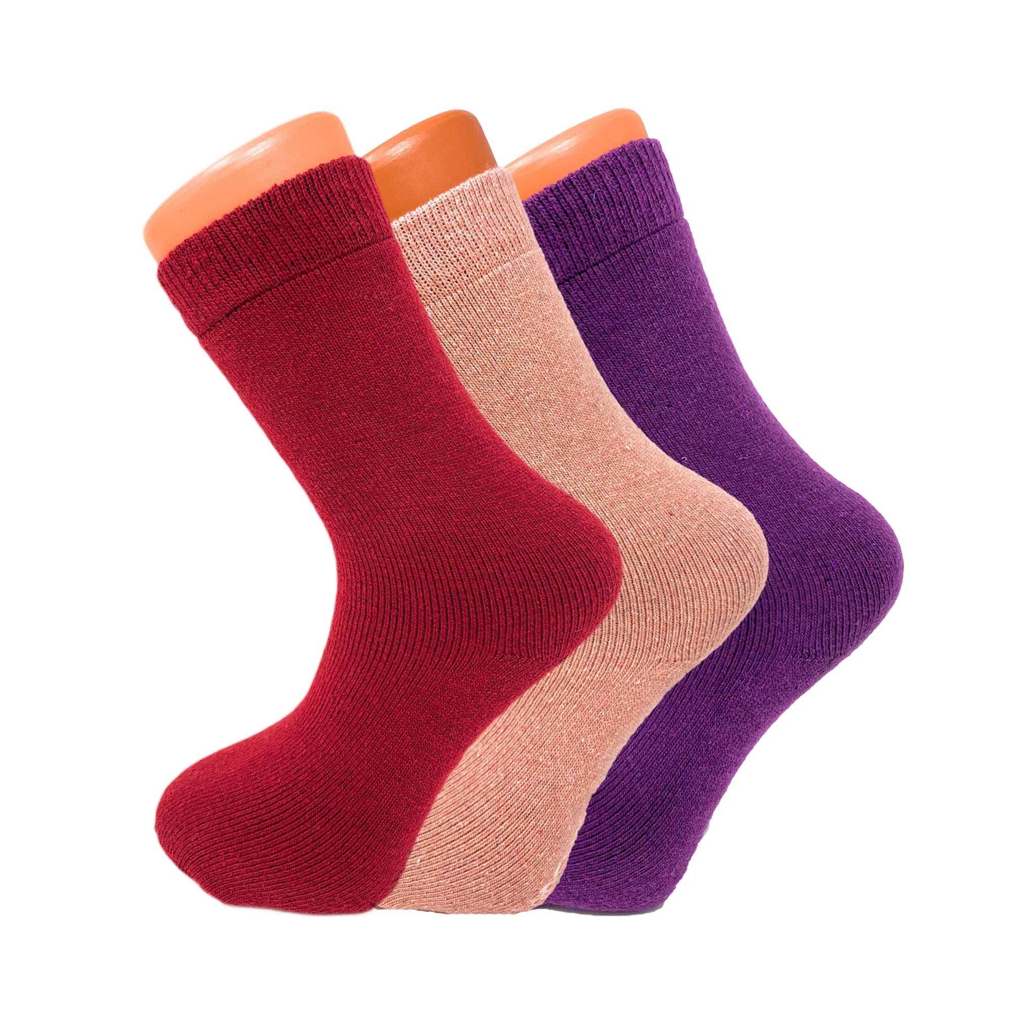 3 pairs of women’s thermal wool crew socks in red, peach, and purple, designed for warmth, comfort, and a snug fit.