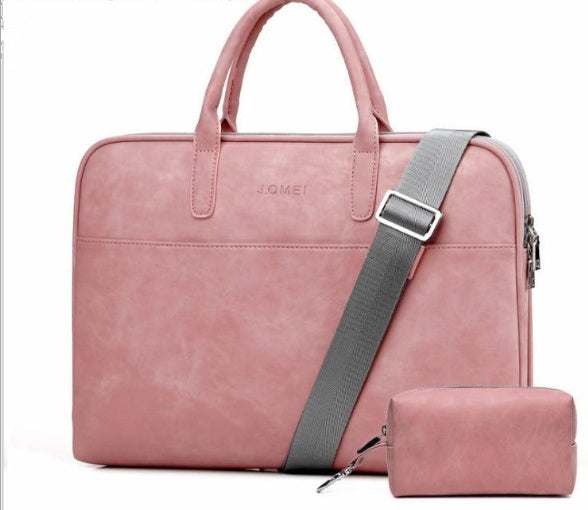 Faux leather laptop bag for women in pink with adjustable strap and small accessory pouch.
