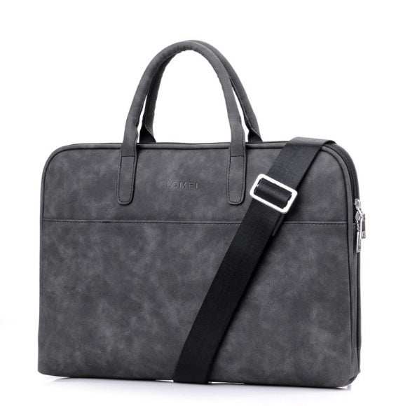 Faux leather laptop bag for women in gray with dual handles and adjustable strap.