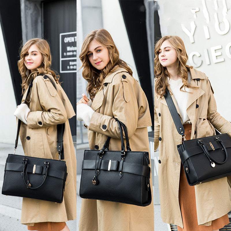 Fashionable computer bag for women showcased by a model wearing a trench coat, highlighting its stylish design.