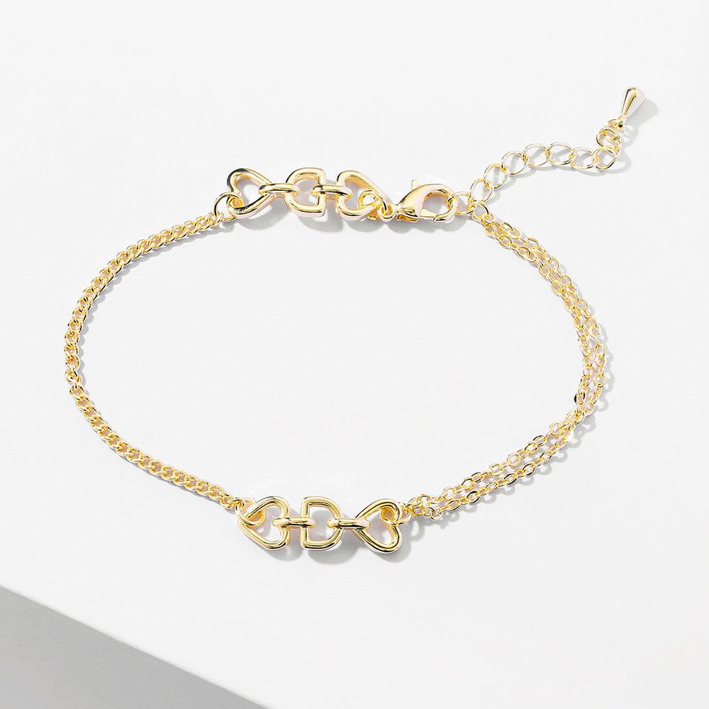 Gold-plated D Love Letter heart charm bracelet with adjustable chain and lobster clasp closure