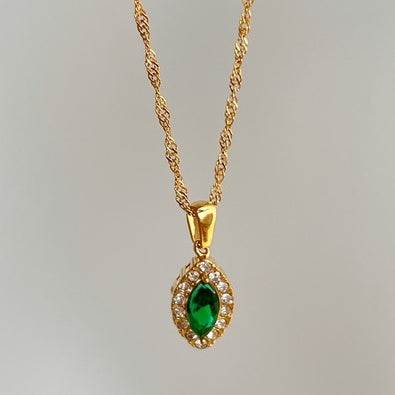 Durable titanium steel necklace featuring a green zircon pendant elegantly set with sparkling accents.