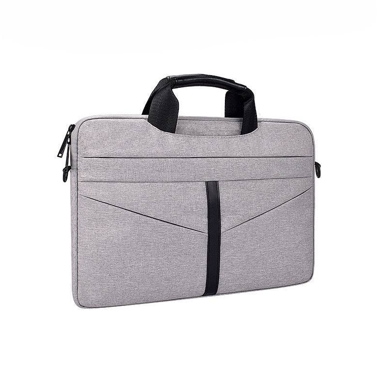 waterproof shoulder computer bag in gray with handles and zipper closures, made of durable fabric.