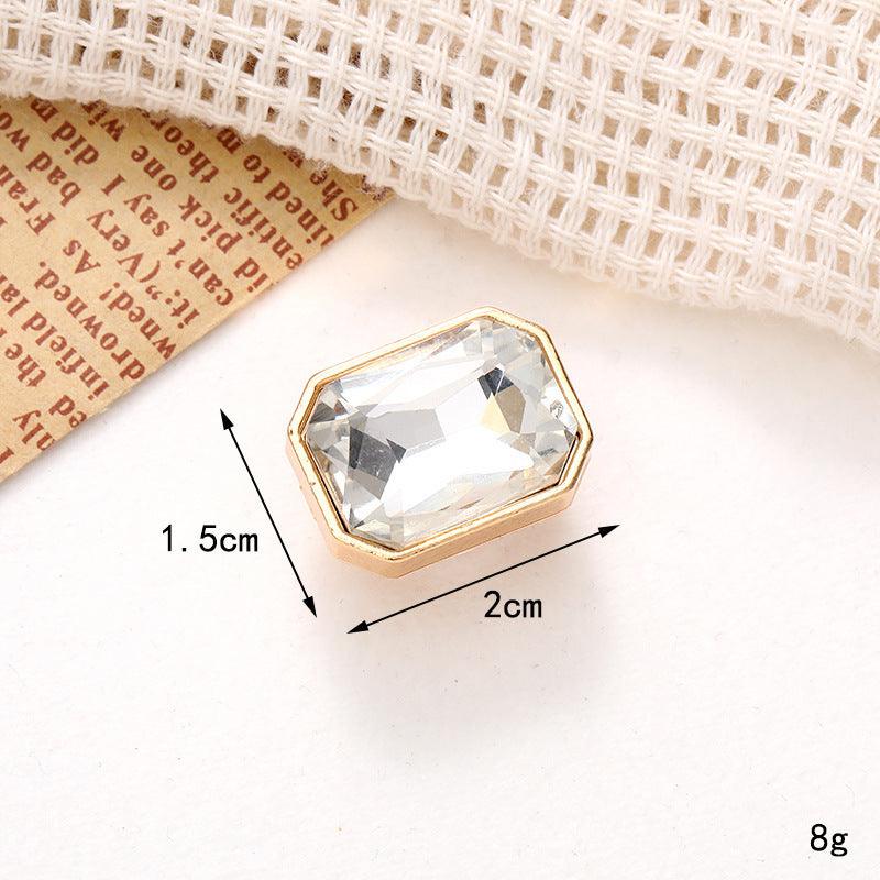 Bright pearl flower shoe ornament featuring a clear crystal embellishment for stylish footwear enhancement.