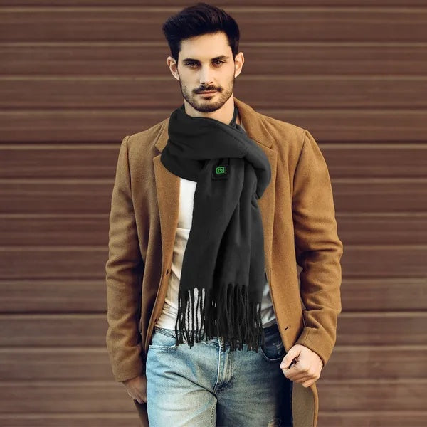 Man wearing an electric heated winter scarf in black, showcasing its stylish design and warmth for outdoor activities.