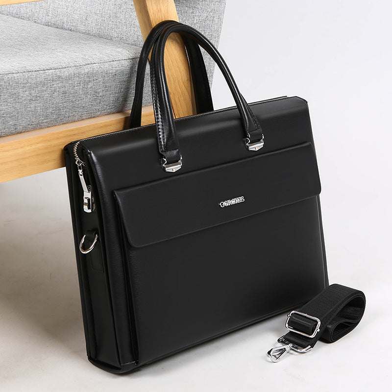 Black anti-theft crossbody handbag with detachable strap, showcasing sleek design and compartments for organizational convenience.
