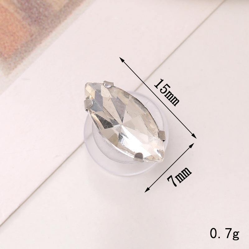 Close-up of a bright crystal floral shoe ornament, measuring 15mm by 7mm, showcasing its elegant design.