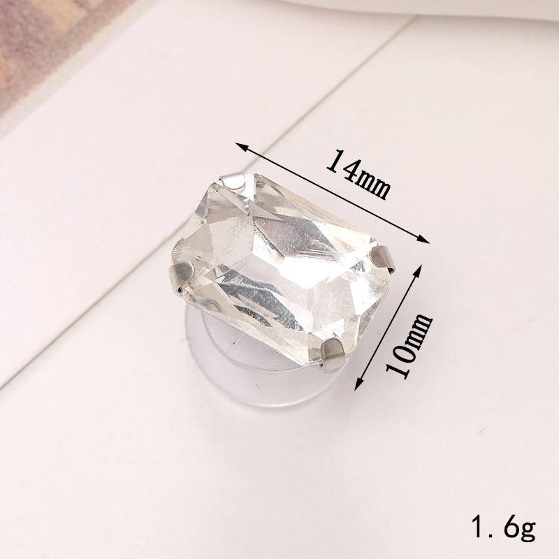 Bright crystal embellishment measuring 14mm x 10mm, perfect for decorating shoes and accessories.