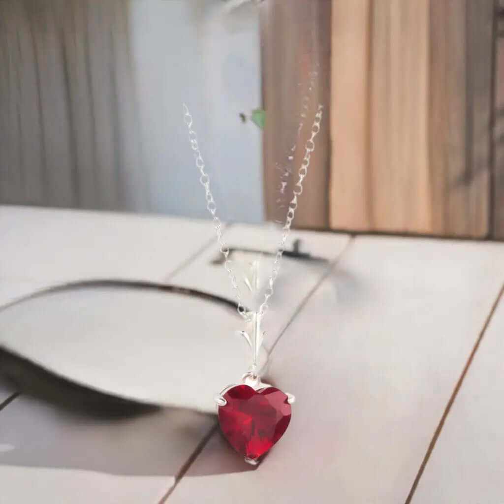 925 sterling silver necklace with red heart-shaped cubic zirconia pendant on a 16-inch link chain