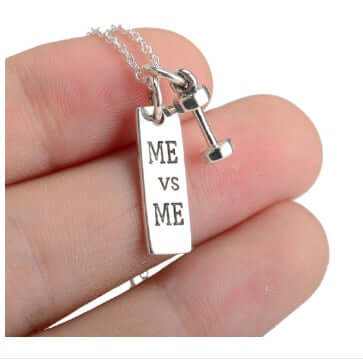 925 sterling silver ME vs ME dumbbell necklace held in hand with chain and square card design