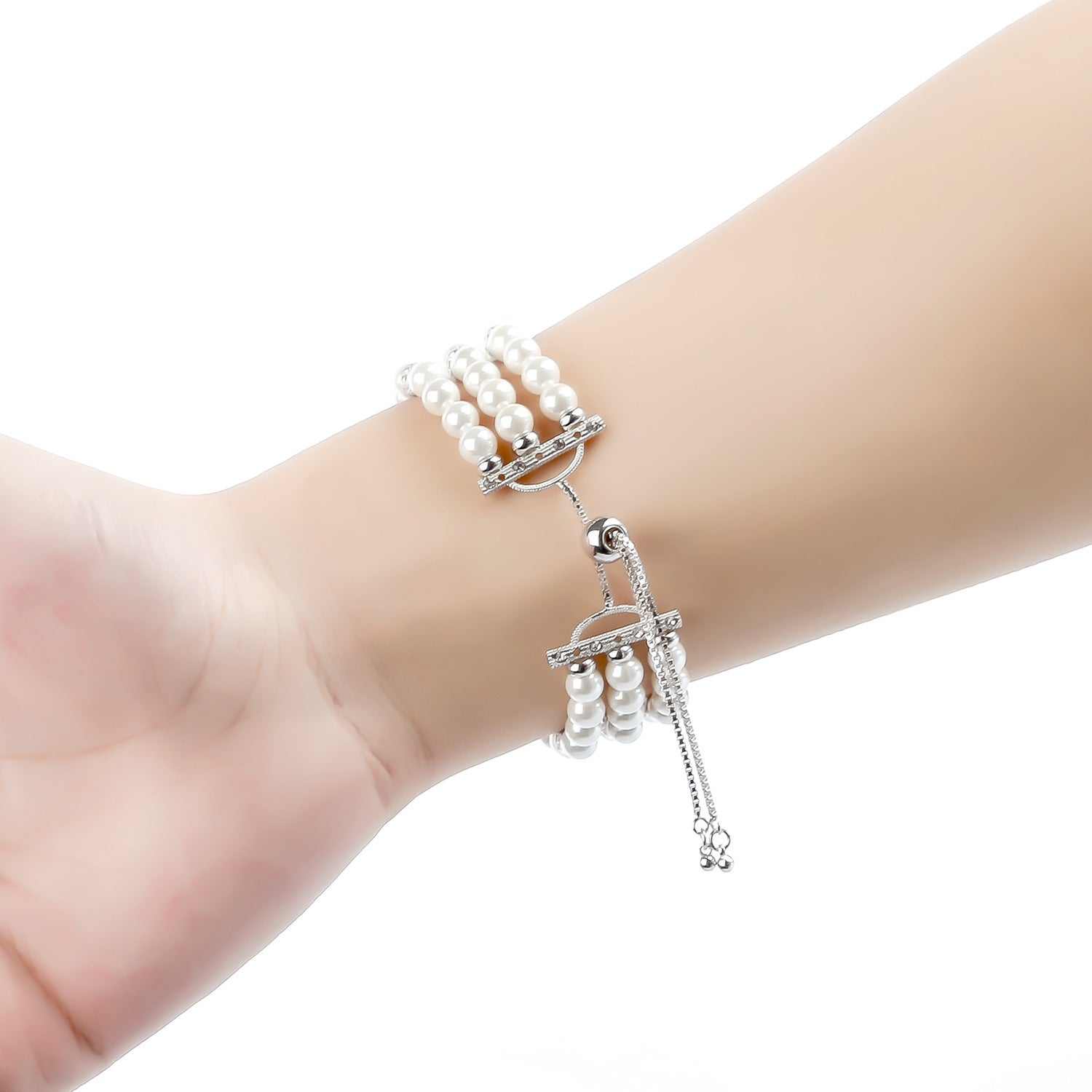Pearl Strap Wristband with alloy clasp worn on wrist, stylish and comfortable accessory