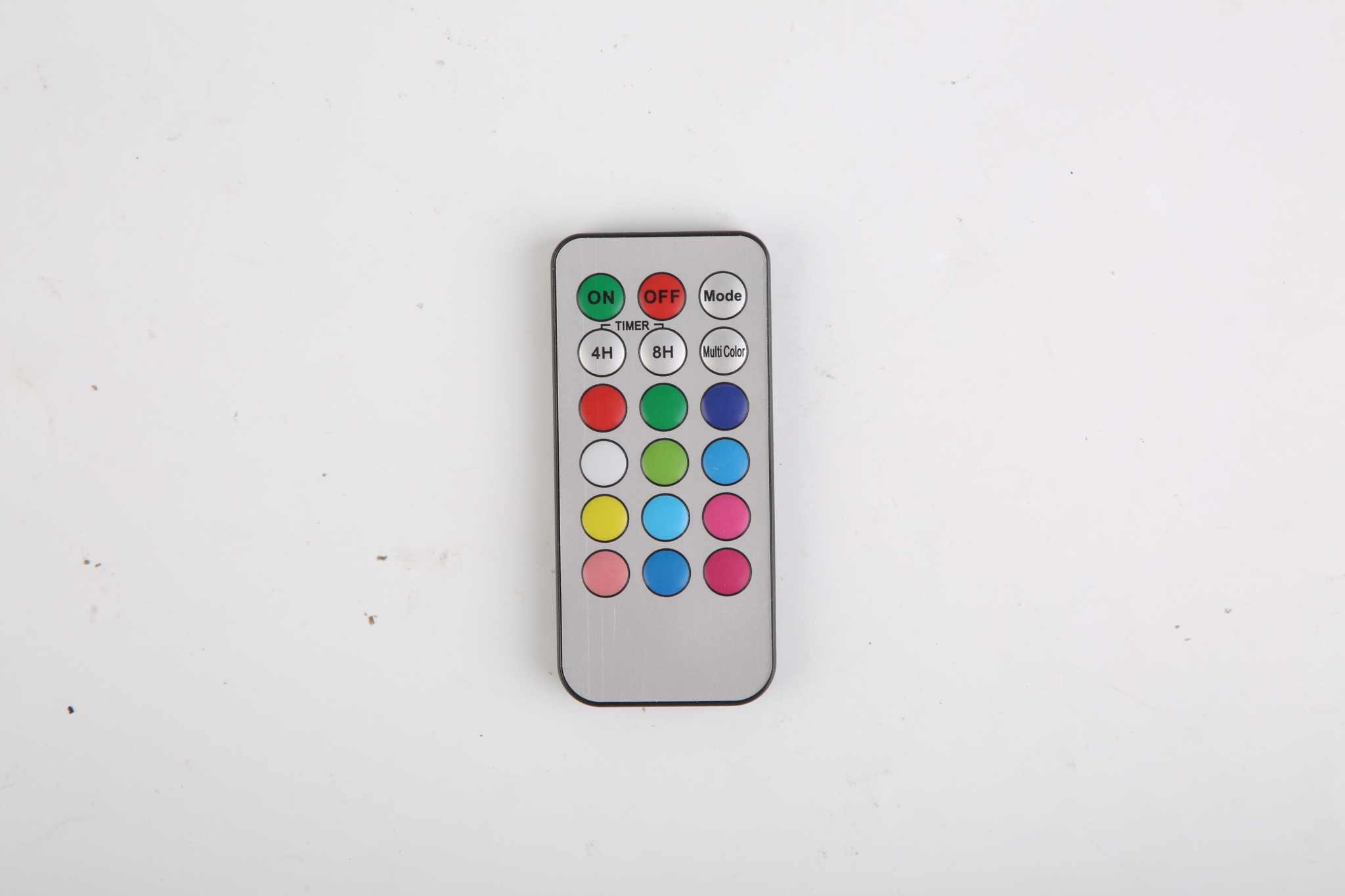 Remote control for Christmas flameless LED candles with color and mode options.