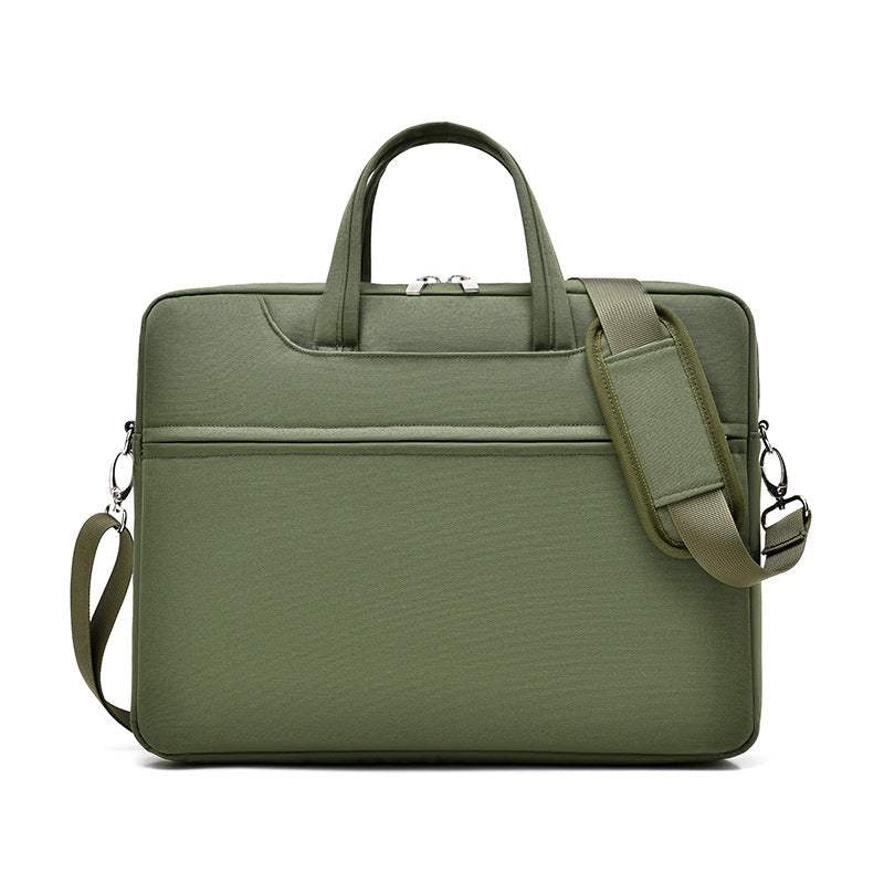 large capacity laptop bag for men in green color with handles and shoulder strap.