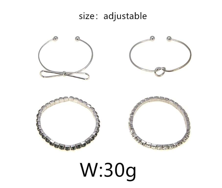 Set of 4 adjustable CZ heart gold crystal bracelets with alloy plating, elegant women's style jewelry