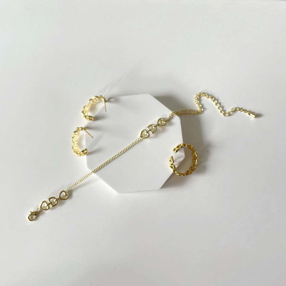 D Love Letter gold-plated copper earrings ring and bracelet set with geometric design and artificial gems