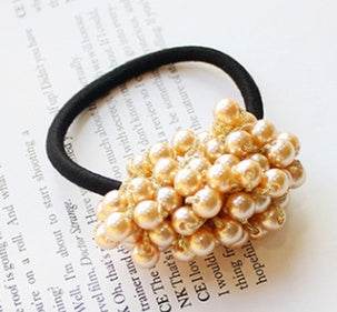 Beaded hair rope with clustered pearl beads on black elastic band