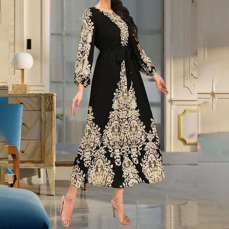 Women's bohemian floral print maxi dress in black with long sleeves and drawstring waist, showcasing ethnic Middle Eastern style.