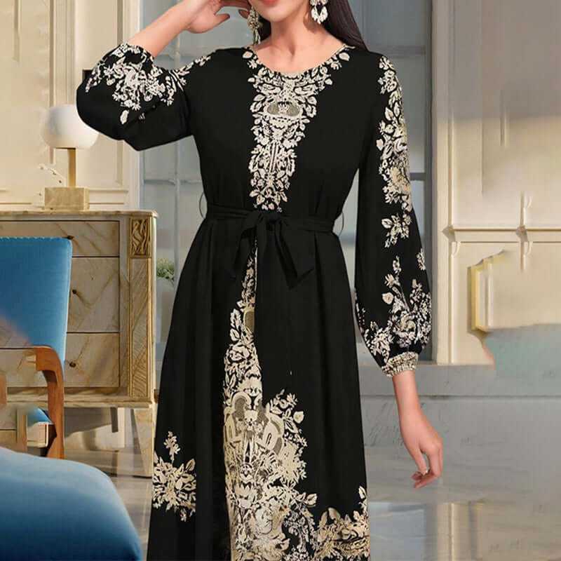 Women's long sleeve black Bohemian floral print maxi dress with drawstring waist, showcasing ethnic Middle Eastern style.
