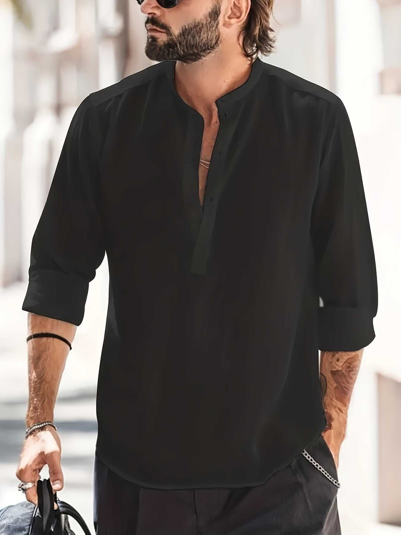 men's black breathable button-down shirt with rolled sleeves and sunglasses