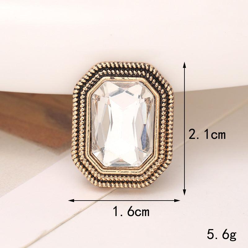 Elegant crystal shoe ornament with gold detailing, 2.1cm x 1.6cm, perfect for footwear embellishment.