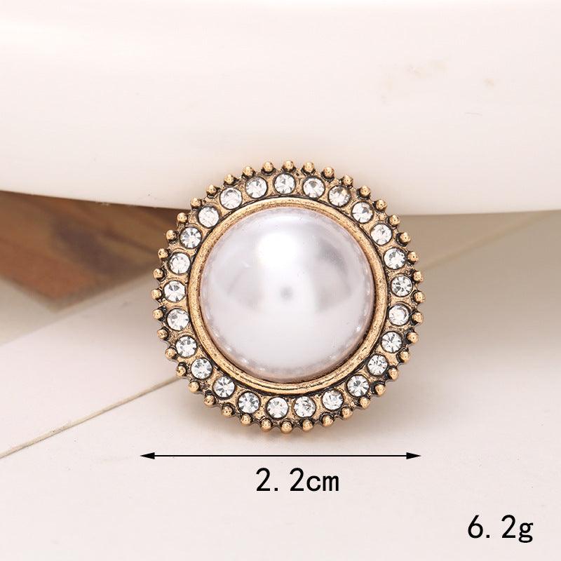 Bright Pearl Flower Shoe Ornament featuring a round pearl center surrounded by sparkling crystals, perfect for shoe embellishment.