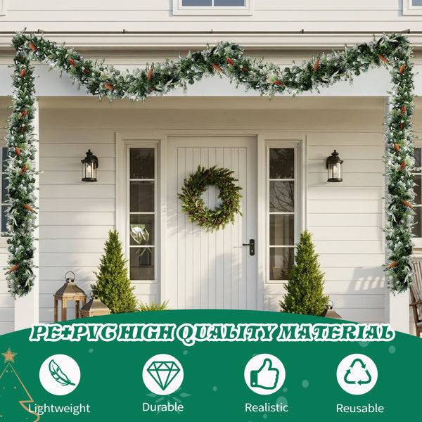 pre-lit snow flocked Christmas garland adorning a festive home entrance with a wreath and greenery.