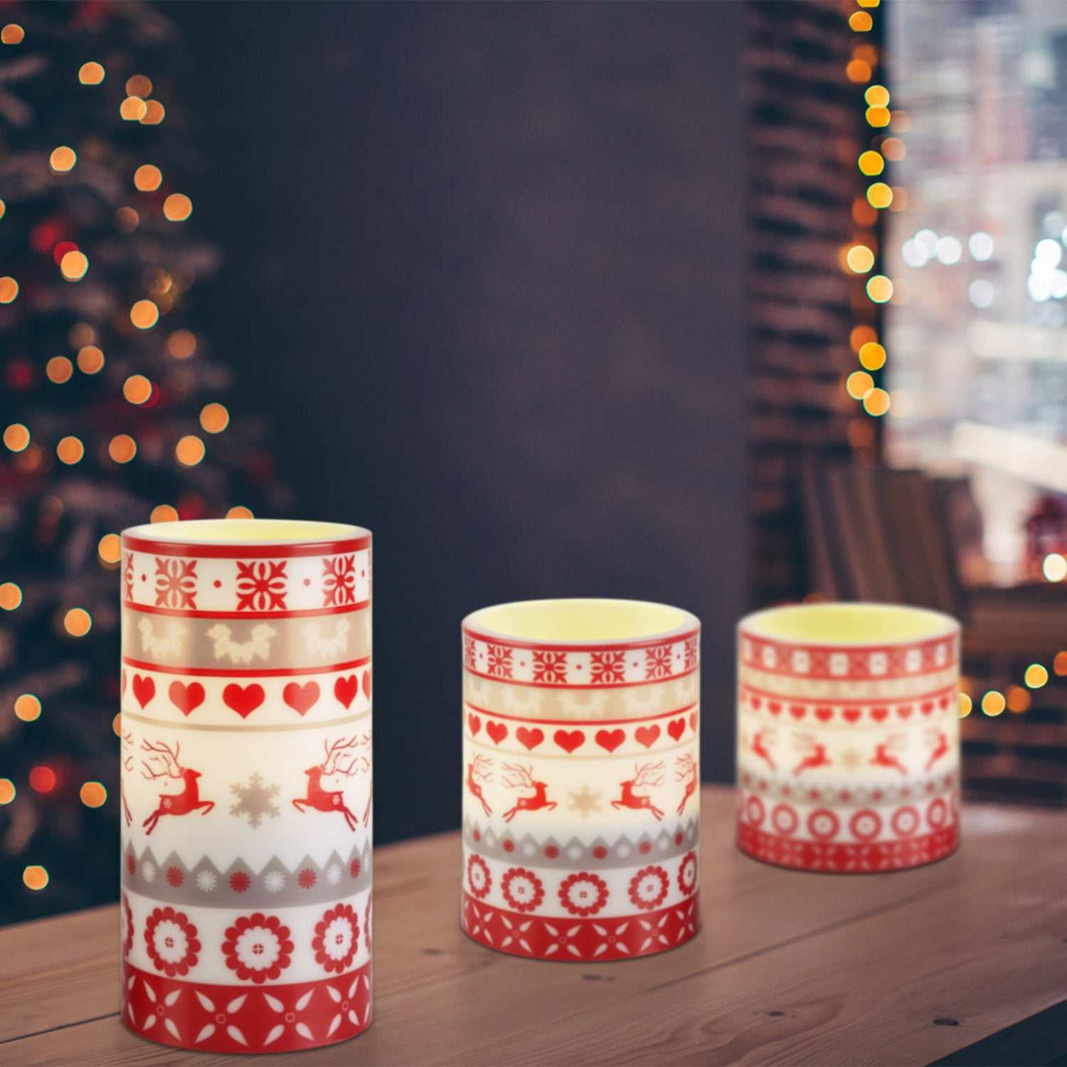 Christmas flameless LED candles in decorative designs, perfect for festive decoration and holiday ambiance.