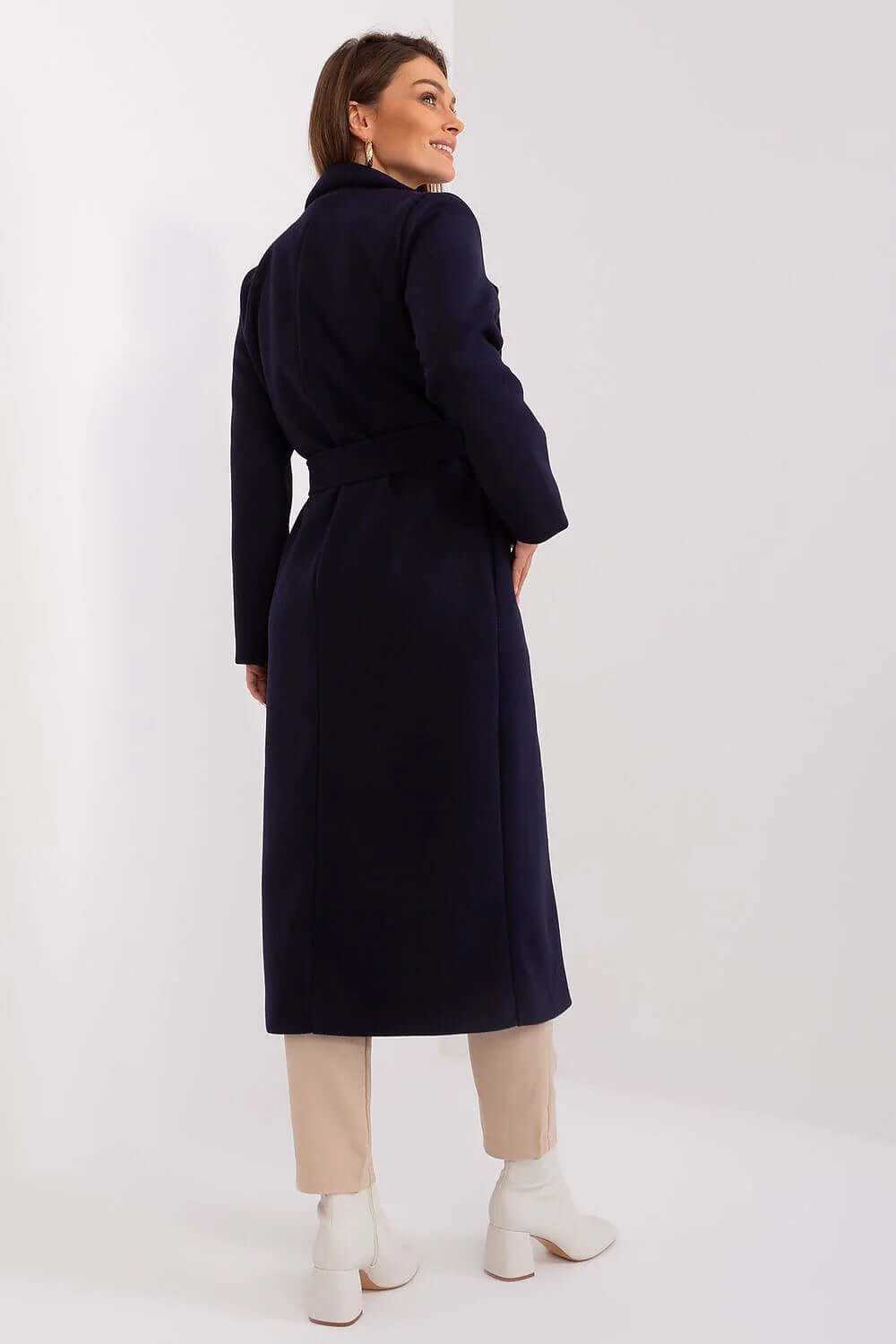 Model wearing a classic wool blend coat in navy with a stylish wrap design, showcasing the back view.