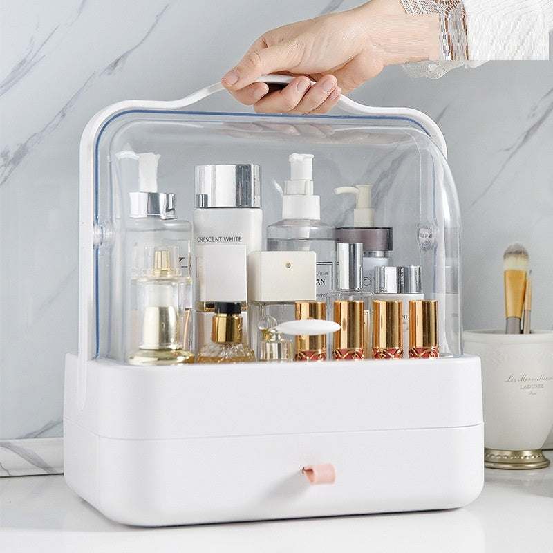 Clear and compact desktop makeup organizer with transparent dustproof cover and white base holding cosmetics.