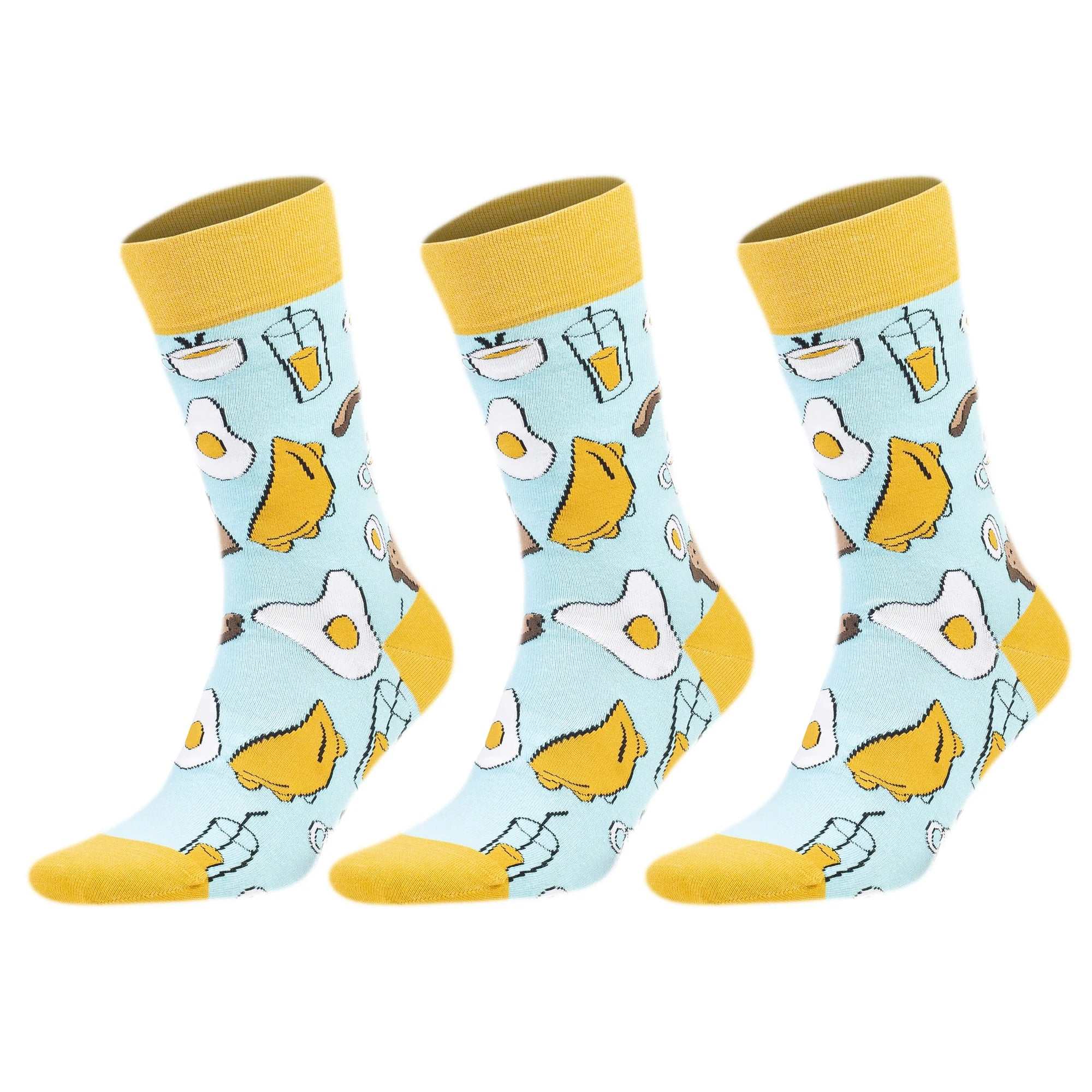 Three pairs of colorful crew socks with playful egg and toast patterns, perfect for adding fun to any outfit.
