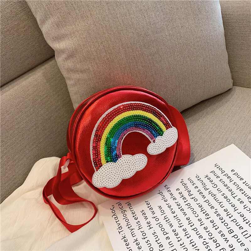 Cute red girls shoulder bag with rainbow design, perfect for kids' urban style, featuring colorful sequins.