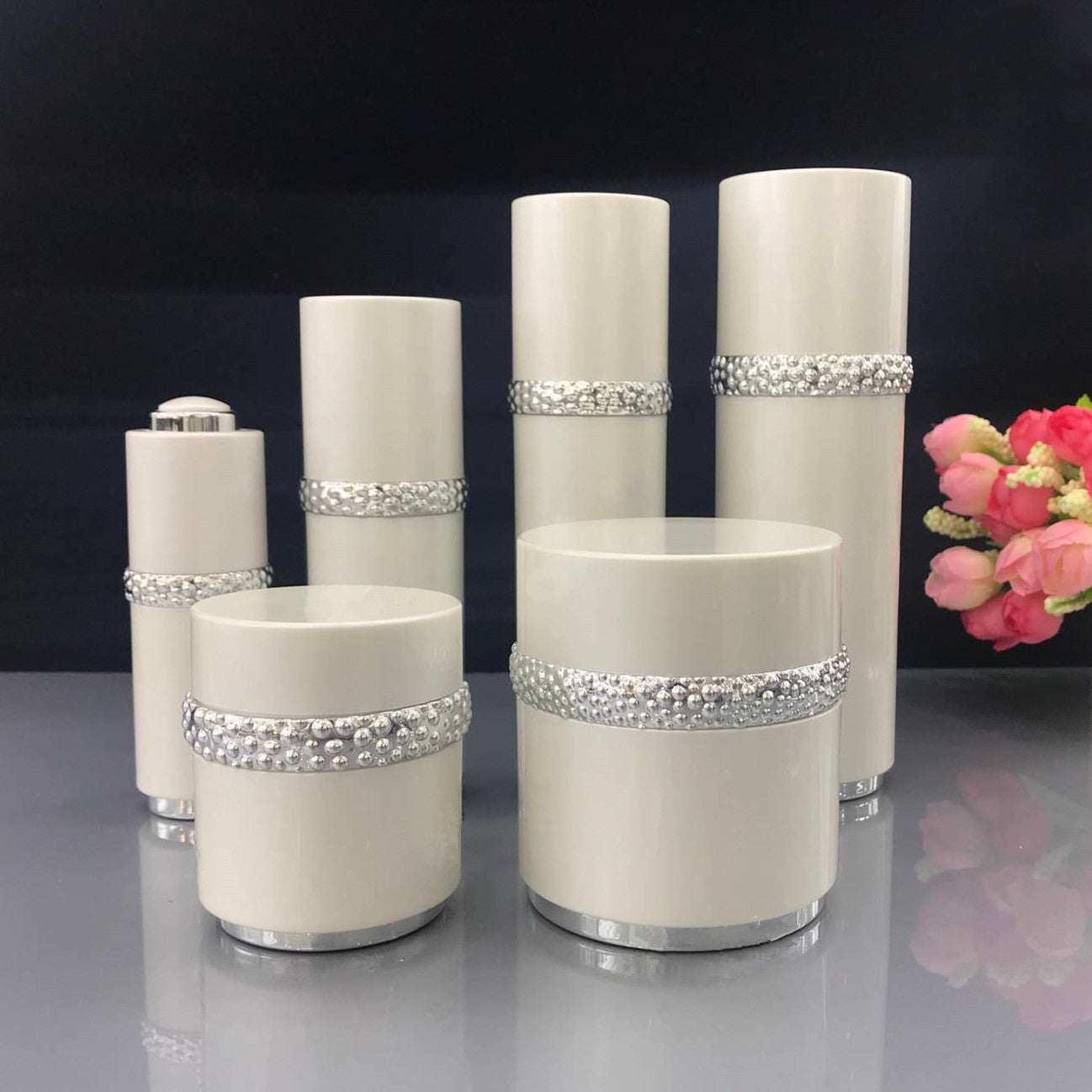 elegant high-grade sub-bottling pearl set with white cream and lotion bottles adorned with rhinestone bands