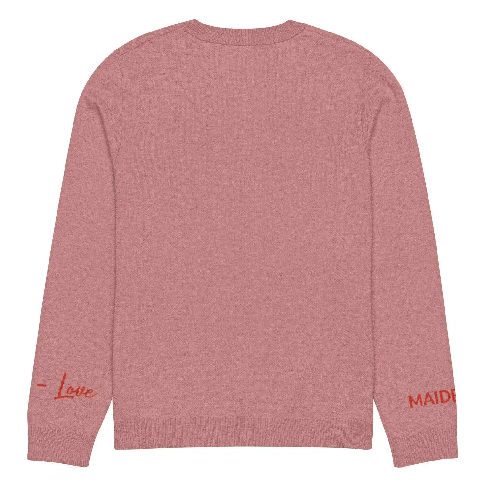Back view of cozy coral knit crewneck sweater featuring 'Love' and 'MAIDEN' embroidered on sleeves.