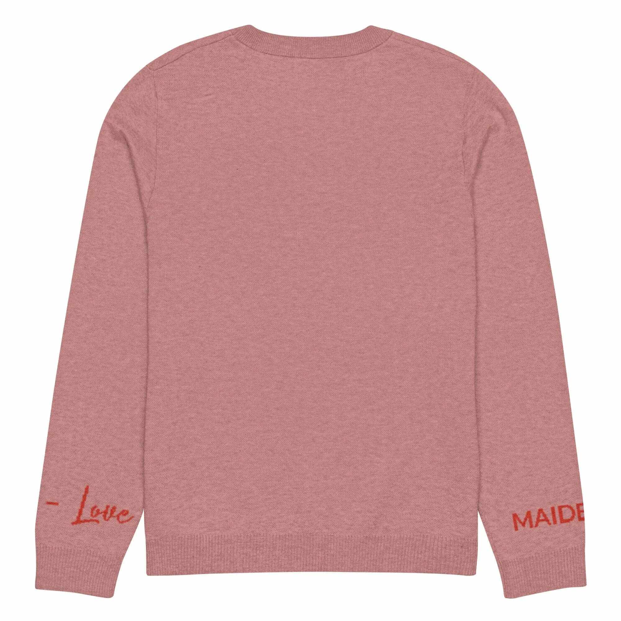 Back view of a Cozy Coral Heart Knit Crewneck Sweater featuring red text on the sleeves.