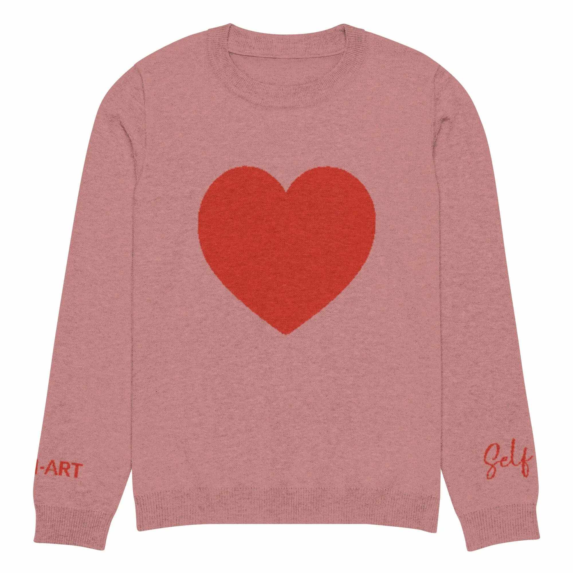 Cozy coral knit crewneck sweater with large red heart design and self-art text on sleeves.