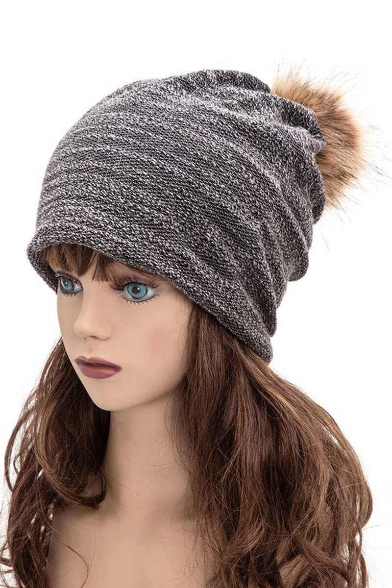 Cozy faux cotton blend slouchy beanie with faux fur pom, perfect for stylish winter wear.