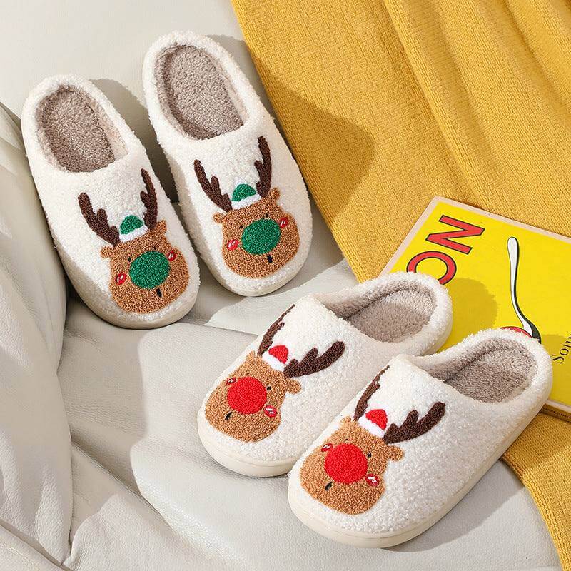 Cozy winter home slippers with reindeer design, plush material, and soft lining for warmth and comfort.