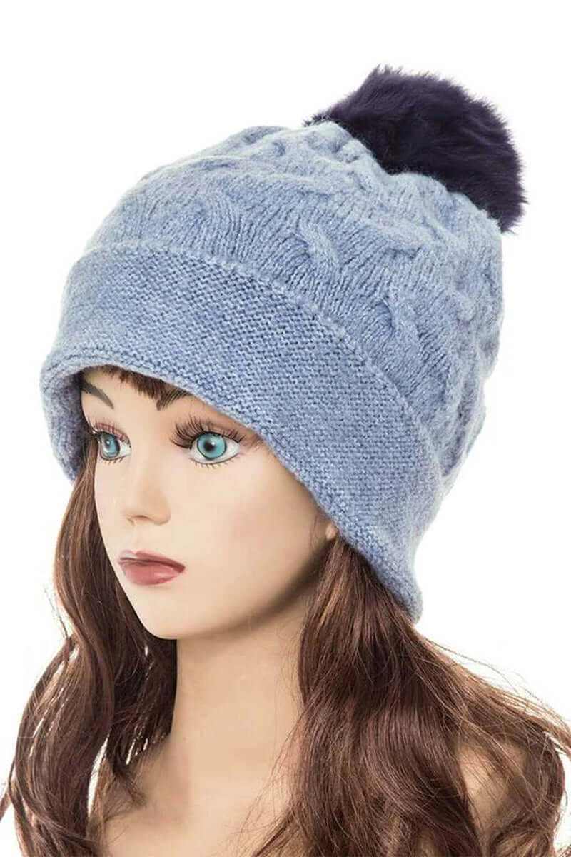Cuffed slouchy beanie with fur pom, cozy knit winter hat in light blue.