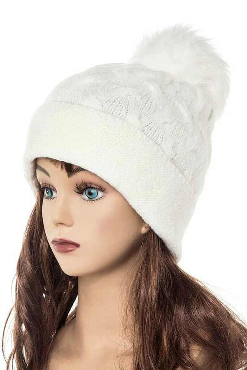 Cuffed slouchy beanie with fur pom, perfect for cold weather style and comfort.