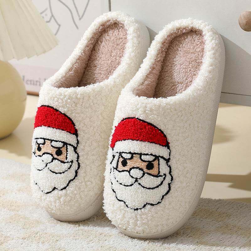 Cozy white Santa Claus slippers with cartoon design and warm plush interior