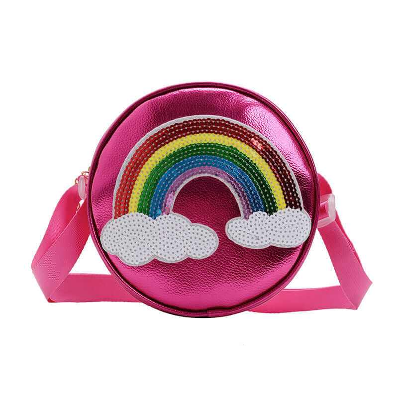 Cute colorful girls shoulder bag featuring a rainbow design and pink strap, perfect for urban style.