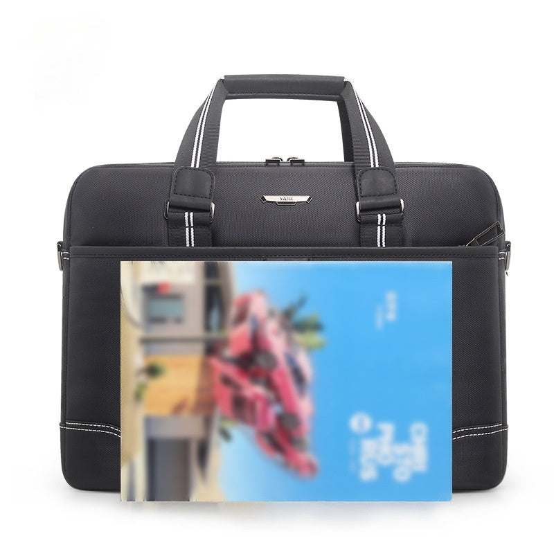 Large capacity men's laptop bag in black with a soft handle and a stylish design, suitable for business travel.