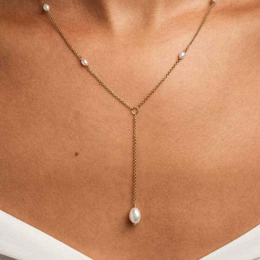 Elegant dainty fresh water pearl necklace featuring a gold plated chain and lustrous pearls for a chic look.